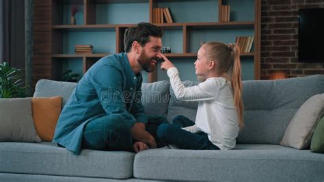 daddy seduces daughter|Loving father and cute daughter playing in bed .